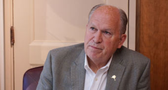 Alaska Gov. Bill Walker listens to a question from KTOO and Alaska Public Media reporter Andrew Kitchenman from his Capitol office in Juneau on June 19, 2018.