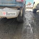 A bumper sticker on a parked car in Utqiaġvik, Alaska. Even though the name has been officially changed from Barrow to Utqiaġvik, these bumper stickers are still available to buy at the Iñupiat Heritage Center in Utqiaġvik. June 5th, 2018. (Photo by Ravenna Koenig, Alaska's Energy Desk.)