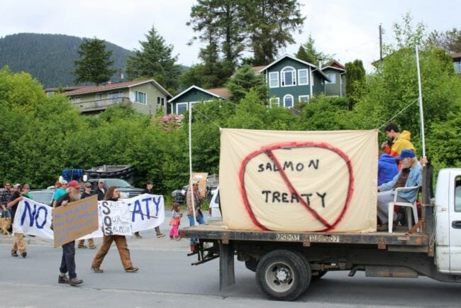 “Take our fish, you take our lives,” shouted rally organizer Caven Pfeiffer. He, along with Deborah Lyons, Pat Kehoe, and other members of the Chinook Futures Coalition are calling for a federal review of Pacific Salmon Treaty negotiations. (Photo by Emily Kwong/KCAW)