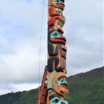 The Yanyeidì Gooch (wolf) totem pole is raised in Savikko Park on June 6, 2018. (Photo by Adelyn Baxter/KTOO)
