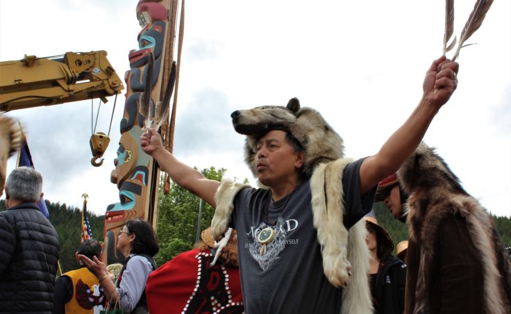 A member of the Yanyeidí clan dances to celebrate the raising of the Gooch (wolf) totem pole at Savikko Park. June 6, 2018. (Photo by Adelyn Baxter/KTOO)