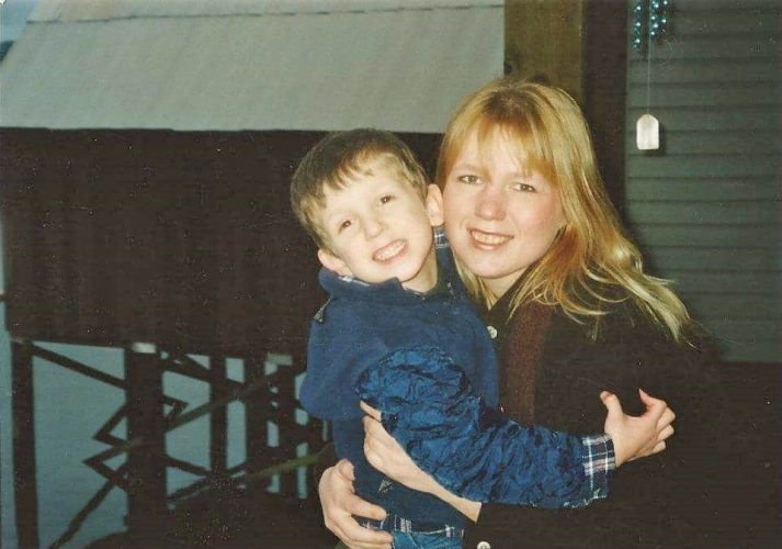 Zack Christensen poses with his mom, Mali Christensen, when he was a boy. (Photo courtesy Mali Christensen)