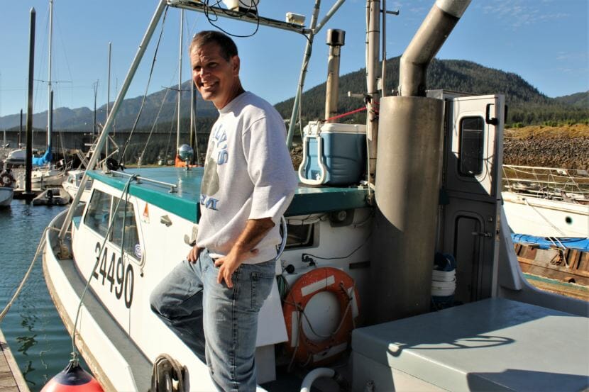 Jerry Nankervis stands in his boat, the Pisces, before heading out to fish on July 29, 2018. (Photo by Adelyn Baxter/KTOO)