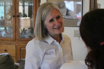 District 34 candidate Andi Story speaks with a voter during a campaign event on July 18, 2018. (Photo by Adelyn Baxter/KTOO)