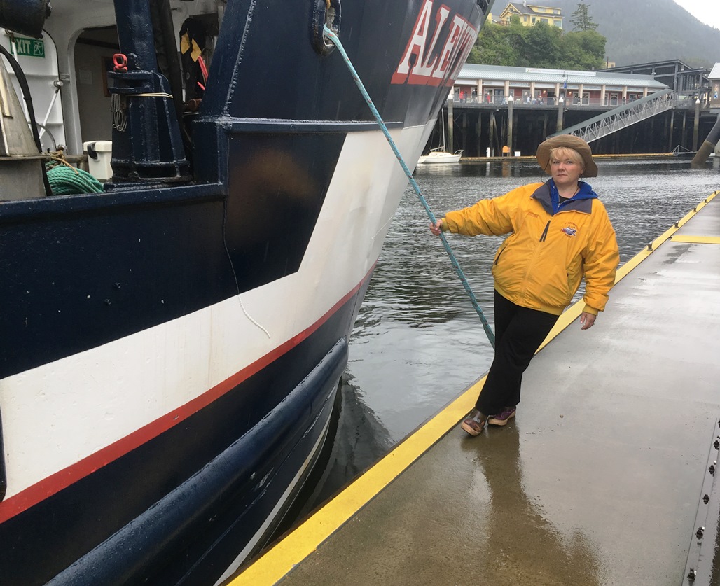 Shauna Lee prepares to cast off the line in 2018 for the Bering Sea Crab Fishermen’s Tour boat. (Photo by Leila Kheiry/KRBD)
