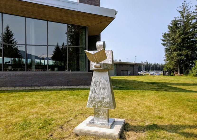 The Mendenhall Valley Public Library installed "The Librarian" on its lawn in July 2018. It's one of six in the world made by Ohio artist James Havens, whose work was underwritten and donated by Juneau man Fred Koken. (Photo courtesy City and Borough of Juneau)