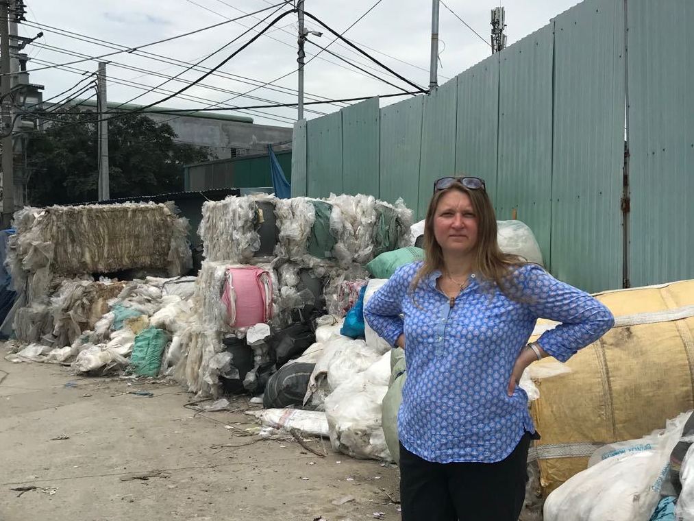 The single largest use for plastic is packaging, Jambeck says. At this recycling center in southeast Asia, much of the waste is thin-film plastic that was once used to package single-use beverage containers. (Photo courtesy Amy Brooks)