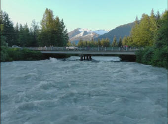 Flooding in the Mendenhall valley on Thursday, Friday, 19, 2018, after a glacial dam burst this week. (Video still by David Purdy/KTOO)
