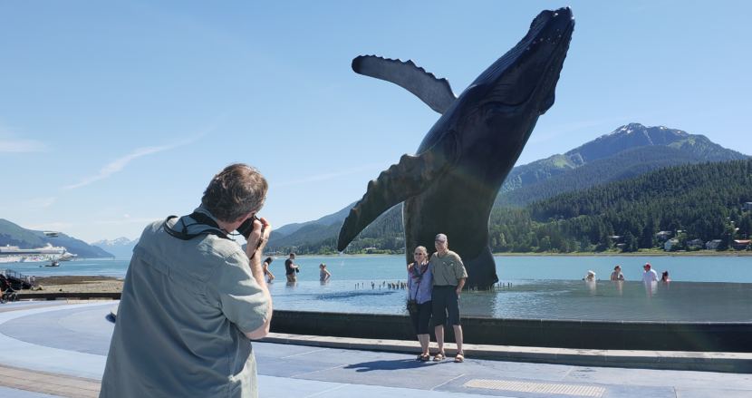 Herman Savikko of Douglas takes a photo of his sister Michele Savikko Bilyeu and her husband Larry Bilyeu of Salem, Oregon, at Overstreet Park in Juneau on July 3, 2018.