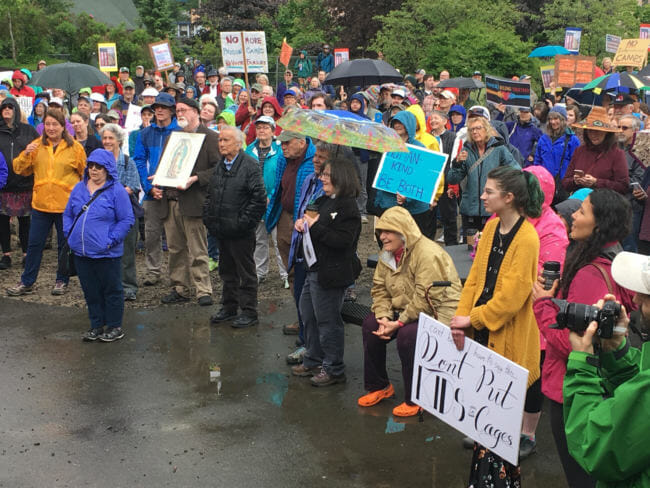 Juneau residents rally against family separation during the Families Belong together Rally on June 30, 2018. (Photo by Adelyn Baxter/KTOO)