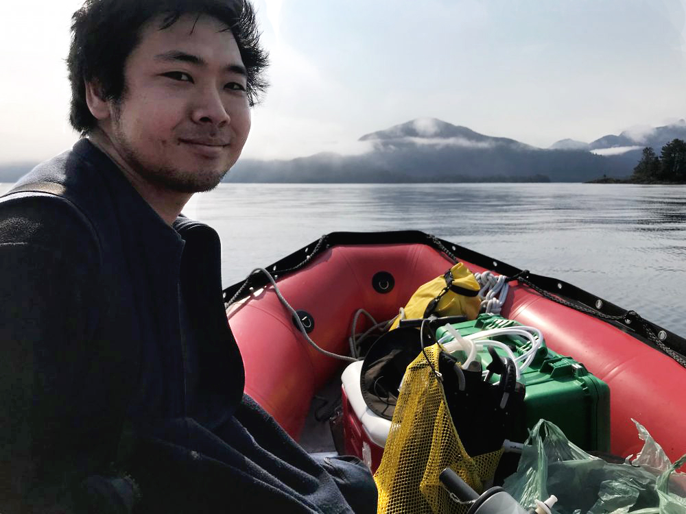 Researcher Umi Hoshijima, heading to the kelp forest he’s studying. (Photo by Rachel Cassandra/KCAW)
