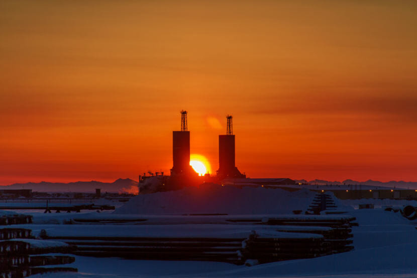 Sunrise on the North Slope behind the two new Parker drilling rigs. (Photo courtesy Kevan Dee) 