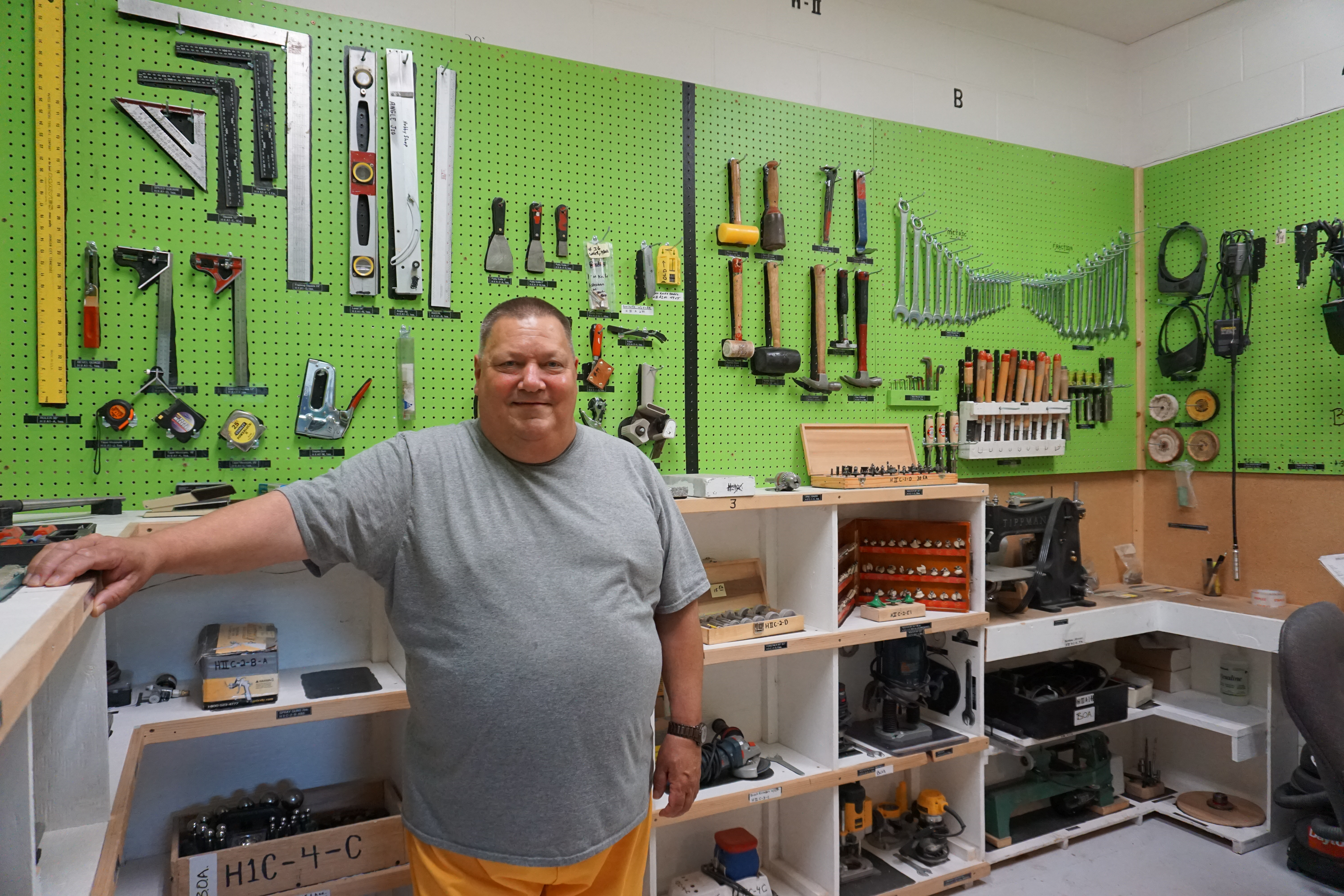 Mike Lawson heads the prison club that provides tools for the hobby shop at Spring Creek Correctional Center. (Photo by Anne Hillman/Alaska Public Media)