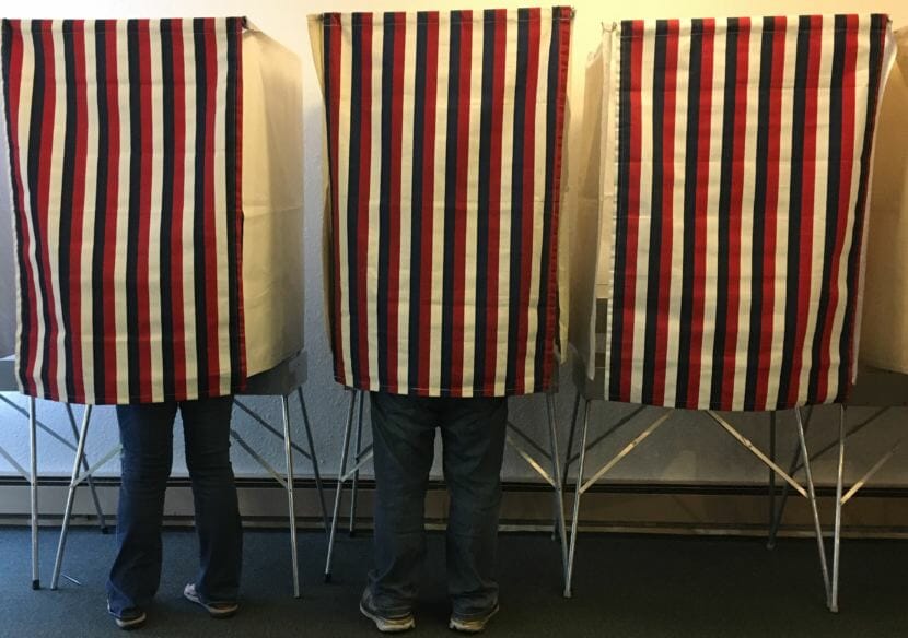 Voters cast ballots in the Aug. 21, 2018, primary election at Glacier Valley Baptist Church in Juneau.