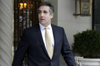 Michael Cohen, former personal lawyer to President Trump, leaves his apartment building, in New York City on Tuesday. (Photo by Richard Drew/Associated Press)