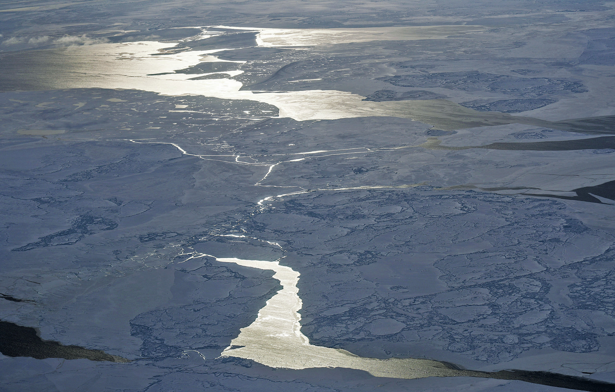 Sea ice is seen from NASA's Operation IceBridge research aircraft off the northwest coast of Greenland on March 30, 2017. (Photo by Mario Tama/Getty Images)