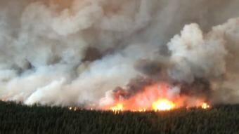 The South Stikine River fire just east of Telegraph Creek, B.C. has grown to around 60 square kilometres in size. The B.C. Wildfire Service said it was burning 'aggressively' on Monday and jumped the Stikine River. (Photo courtesy British Columbia Wildfire Service)