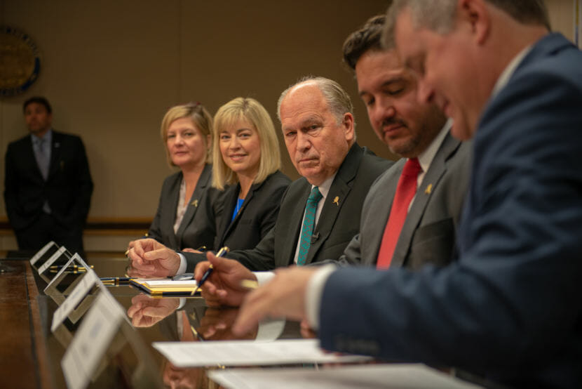 (left) Attorney General Jahna Lindemuth, ExxonMobil Alaska Production Manager Darlene Gates, Alaska Gov. Bill Walker, BP Vice President of Commercial Ventures Damian Bilbao, and DNR Commissioner Andy Mack, during a signing ceremony for the Gas Sales Precedent Agreement with ExxonMobil and the Point Thomson Letter Agreement between the State of Alaska, ExxonMobil and BP on Monday, September 10, 2018 at the Atwood Building in Anchorage, Alaska. (Photo courtesy/Gov. Bill Walker's office)