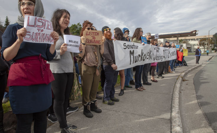 More than 130 people gathered outside of U.S. Sen. Lisa Murkowski's office in Juneau to rally against the confirmation Brett Kavanaugh to the U.S. Supreme Court on Sept. 28, 2018.