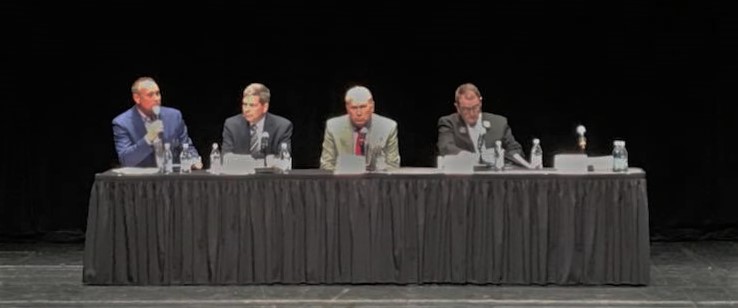 Gary Ferguson moderates the Downtown Anchorage Partnership forum on Thursday, Sept. 13, 2018. Also pictured from left to right: Democrat and former U.S. Sen. Mark Begich, independent incumbent Gov. Bill Walker, Libertarian Billy Toien, and an empty chair left in case Republican former state Sen. Mike Dunleavy showed up. He didn't.