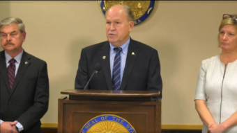 Public Safety Commissioner Walt Monegan, Gov. Bill Walker and Attorney General Jahna Lindemuth spoke about different public-safety proposals by the Walker administration at a press conference at the Atwood Building in Anchorage, Oct. 1, 2018. (Screen capture of streaming video by the office of the governor)