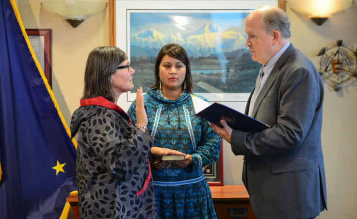 Valerie Nurr'araaluk Davidson is sworn as lieutenant governor during a ceremony with Director of Rural and Native Affairs Barbara Blake and Gov. Bill Walker in Anchorage on Tuesday, Oct. 16, 2018.