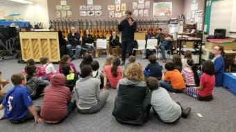 Composer Emerson Eads talks to a class about the opera. (Photo courtesy of Orpheus Project)
