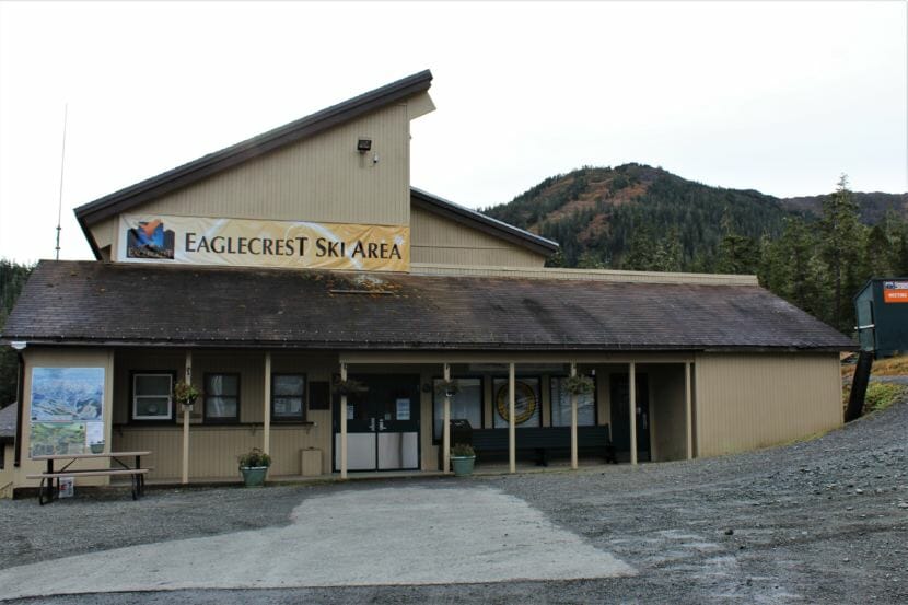 Eaglecrest Ski Area's main lodge with ski slopes in the background. (Photo by Adelyn Baxter/KTOO)