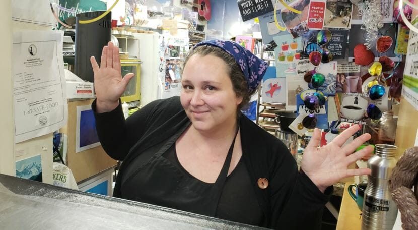 Jeste Burton posts for a photo in her shop, Pie in the Sky, in downtown Juneau on Oct. 11, 2018.