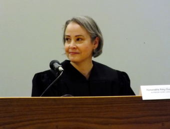 Superior Court Judge Amy Gurton Mead listens to other judges during her installation and robing ceremony Oct. 26, 2018 at the Dimond Courthouse.