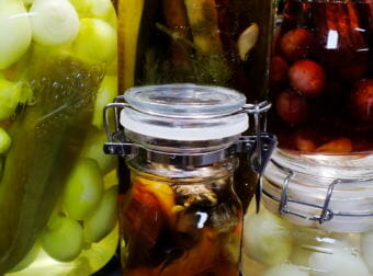 Homegrown onions, cucumbers, peppers, and mushrooms get pickled in a North Douglas kitchen.