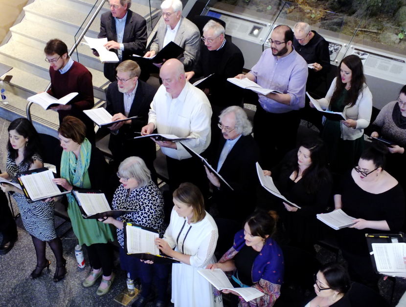 The chorus sings during a preview of The Princess Sophia opera at the Father Andrew P. Kashevaroff State Library, Archives, and Museum in March 2018.