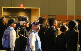 Benno Cleveland during the posting of colors by the color guard during the Alaska Federation of Natives conference on October 18, 2018.