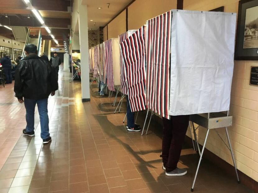 Voters mark their ballots at Ketchikan’s Precinct No. 2 at The Plaza on Nov. 6, 2018.
