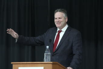 Gov.-elect Mike Dunleavy speaks to the Alaska Miners Association about his plans for his administration. He named Tuckerman Babcock to be his chief of staff and transition chairman. (Photo by Wesley Early/Alaska Public Media)