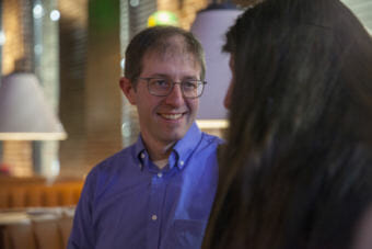 Senate District Q candidate Jesse Kiehl, a Democrat, talks to a supporter on Election Day, Tuesday, November 6, 2018, in Juneau, Alaska. (Photo by Rashah McChesney/Alaska’s Energy Desk)