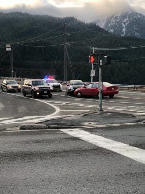 Police close one lane of the Douglas Bridge in Juneau the afternoon of Nov. 30, 2018, after two cars collided head on.