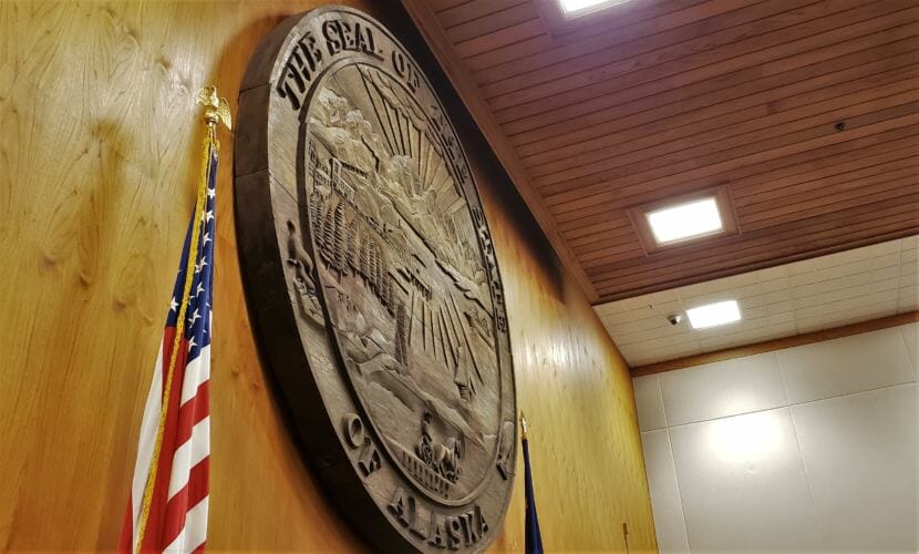 This massive seal of the state of Alaska hangs on April 19, 2018, behind the dais where Alaska Supreme Court justices hear cases in the Boney Courthouse in Anchorage.