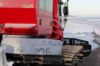 Detail written in snow on the PistenBully –Snow Place Like Home.