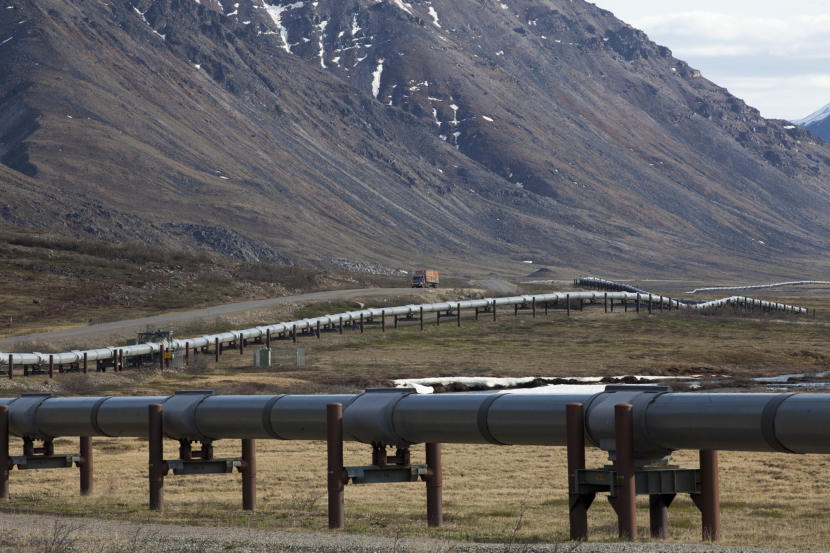 A truck drives up the Dalton Highway near the Toolik Field Station on June 9, 2017, in the North Slope Borough. (Photo by Rashah McChesney/Alaska's Energy Desk)