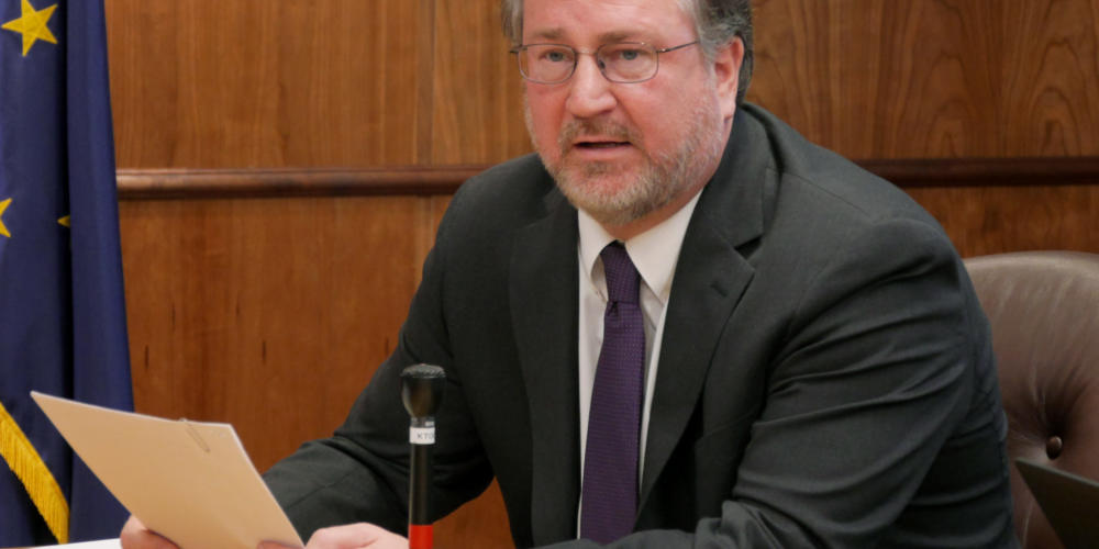 Attorney General Kevin Clarkson reads summaries of three constitutional amendments proposed by Gov. Mike Dunleavy to reporters at a press conference in the Capitol in Juneau on Jan. 30, 2019.
