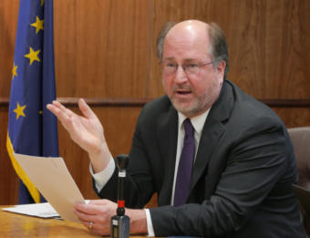 Attorney General Kevin Clarkson reads summaries of three constitutional amendments proposed by Gov. Mike Dunleavy to reporters at a press conference in the Capitol in Juneau on Jan. 30, 2019.