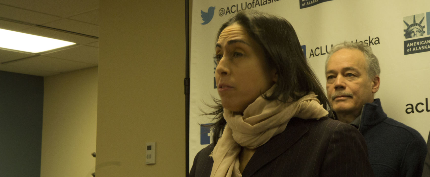 Former Assistant Attorney General Libby Bakalar speaking at a press conference on Jan. 10, 2019. Bakalar is one of three plaintiffs in a lawsuit filed by the ACLU of Alaska against the Dunleavy administration, claiming that she was illegally terminated by the governor. (Photo by Wesley Early, Alaska Public Media)