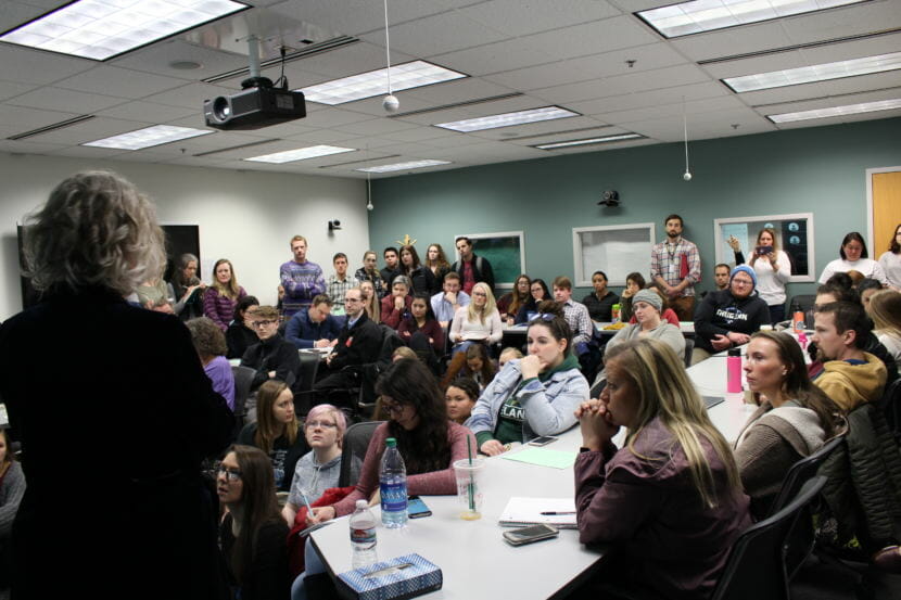 University of Alaska Anchorage School of Education interim director Claudia Dybdahl (left) speaks with over 60 education students about the future of the department.