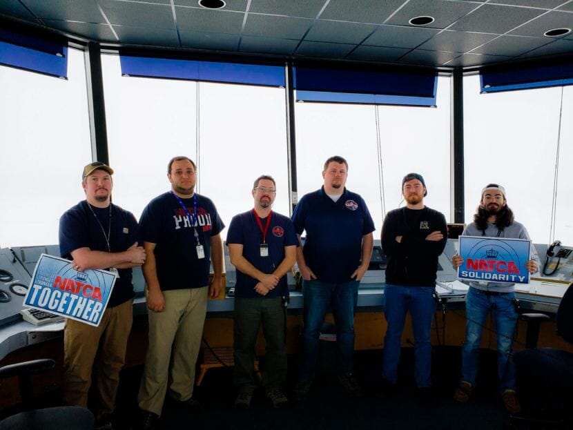 Air traffic controllers whoa re members of the union National Air Traffic Controllers Association pose for a photo in the tower of Juneau International Airport in this undated photo. From left to right: Devin Styers, Lenny Zeifman, Dan Parks, Rob Swinton, Steve Ott and Bryan Barrett.