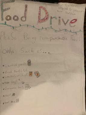 Students at Montessori Borealis made posters to advertise their food drive in Jan. 2019 to replenish the Southeast Alaska Food Bank, which saw increased demand during the partial government shutdown. (Photo courtesy of Callie Conerton)