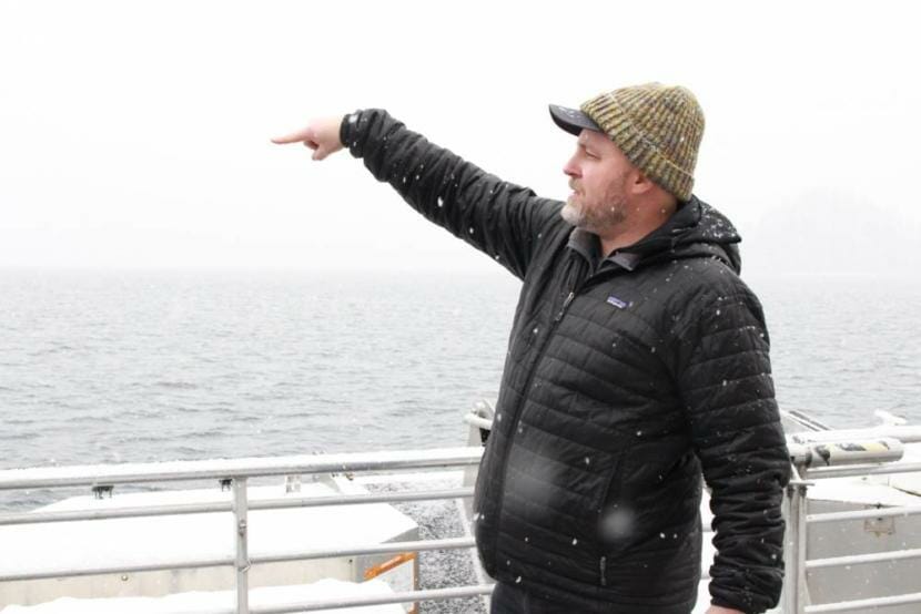 Silver Bay Seafoods representative Tommy Sheridan answers questions on Feb. 4, 2019, from the bow of a chartered boat near Olga Point.