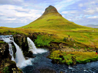 The iconic mountain of Kirkjufell in west Iceland, one of the country's top five most visited places. (Public domain photo by moonjazz)