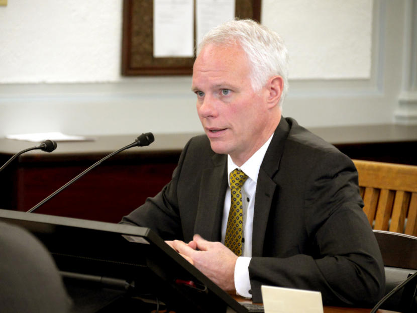 State Investment Officer Deven Mitchell with the Department of Revenue gives an overview of the state’s credit ratings and debt to the Senate Finance Committee in Juneau on Feb. 4, 2019.