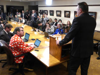 Gov. Michael Dunleavy introduces his state budget to reporters at a press availability at the Capitol in Juneau on Feb. 13, 2019.